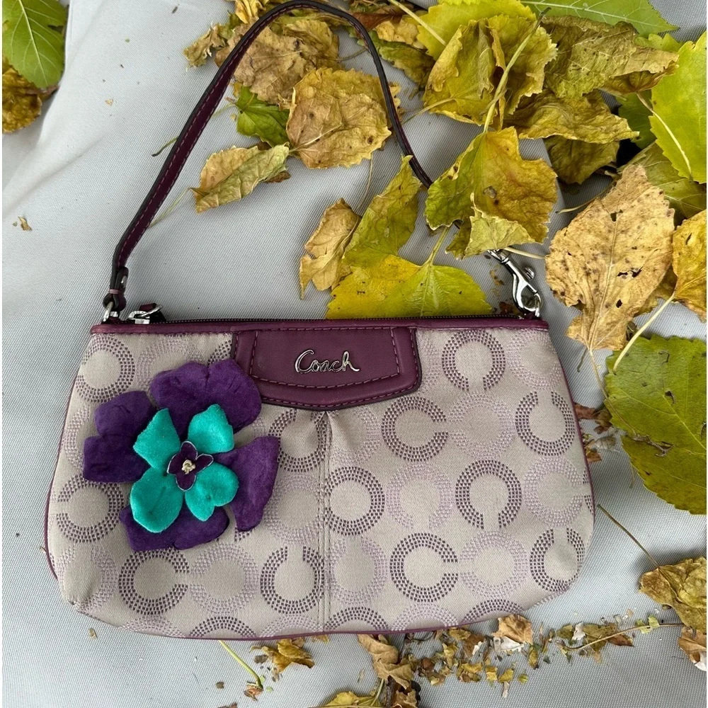 Coach Wristlet with suede flowers. Upstyled for a fresh new look. 9.25x5.5 x1”